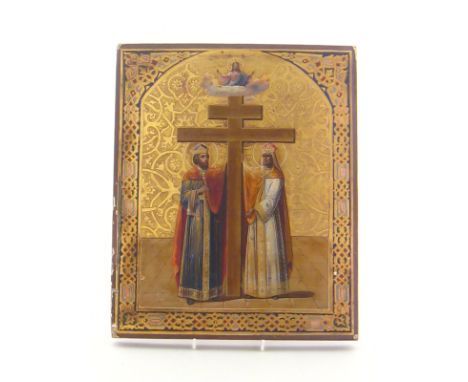 A Russian 19th. century braced panel painted and gilt icon of two patriarchs beside a cross, Christ in Majesty above. 33.5x27