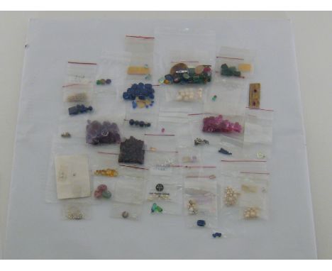 A large quantity of untested loose polished "stones" including paste, cultured pearls etc. VAT will be added to the hammer on