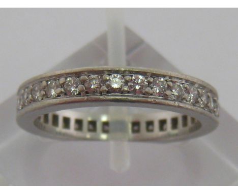 A Bulgari platinum and diamond eternity ring, Italian standard marks and French post 1927 import mark, estimated total diamon