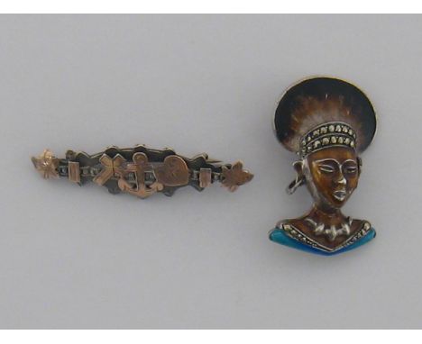 A silver, enamel and marcasite brooch, modelled as a tribal bust, stamped 925 verso, 38mm long, together with a late Victoria