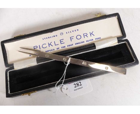 An Elizabeth II silver pickle fork, Francis Howard Ltd, Sheffield, 1959, in fitted leather clad case, 1.2ozt