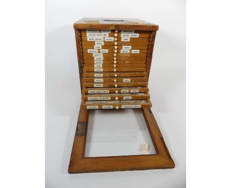 An early 20th century pitch pine microscope slide case, contents to include various medical and botanical specimen slides, wi