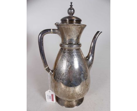 A Victorian silver coffee pot, the hinged domed cover with globular finial to ovoid body engraved with floral cartouches on a