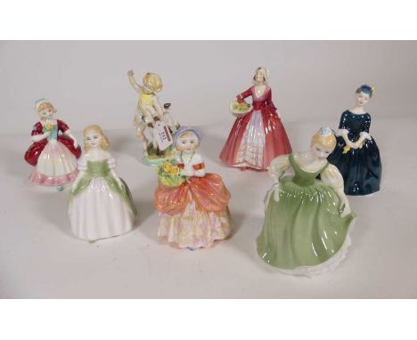 A collection of porcelain figures ot inlcude Royal Worcester example "April", and Royal Doulton figures of ladies, Penny, Val