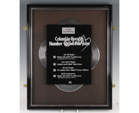 Paul McCartney, a signed presentation, four silver discs with presentation plaque for Columbia Records Number 1 For Everythin