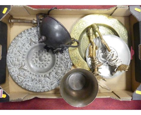 A collection of metal ware to include a bronze pestle &amp; mortar, a repoussee decorated copper charger, and a pair of ornat