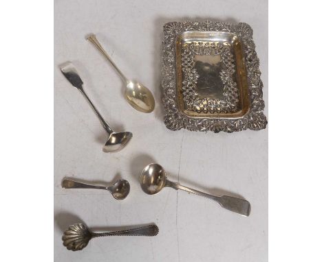 A late Victorian silver pin dish of shaped rectangular form, the border repoussee decorated with shells and flowers, together