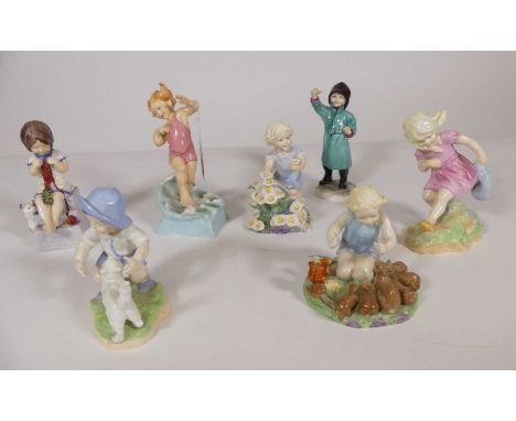 A collection of seven Royal Worcester porcelain figures of children to include September, height 12cm, March, Woodland Dance,