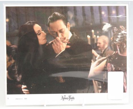 A collection of front of house / lobby cards, mainly U.S. and UK examples to include Year Of The Dragon, The Addams Family, T