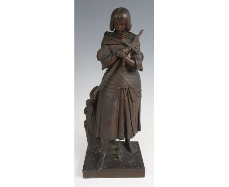 After Marie d'Orleans - a late 19th century French bronze figure of Jeanne d'Arc, modelled in standing pose with hands crosse