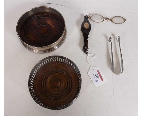 An early 20th century simulated tortoiseshell lorgnette, having a yellow metal oval cartouche with engraved initial cypher, l