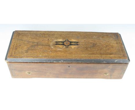 A late 19th century Swiss music box by Nicole Freres, the lever wind mechanism playing eight airs on a 13" cylinder, housed i