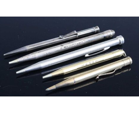 An engine turned steel yard-o'-lead pencil, in box; together with other propelling pencils (rolled gold) to include an exampl