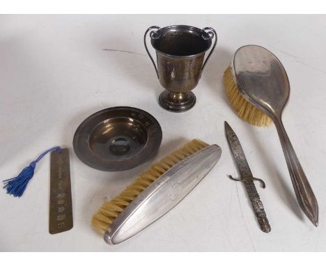 A George VI silver trophy cup with twin scroll handles on domed foot with presentation inscription for the Waterford Golf Clu
