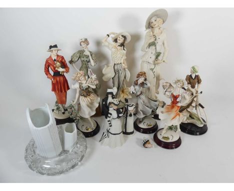 A collection of eight Guiseppe Armani resin figures of ladies, largest height 42cm, together with three Wedgwood bisque porce