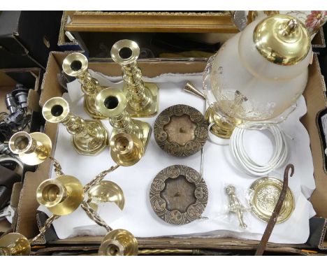 A collection of mainly brass items, to include a four-branch candlestick, two matching large candlesticks, brass lamp etc 
