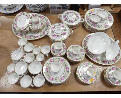 A collection of Royal Worcester 'Royal Garden' pattern table ware, to include a pair of tureens, oval meat plates, dinner pla