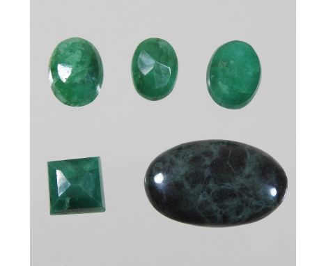 A collection of four natural unmounted emeralds, together with a jade cabochon (5)