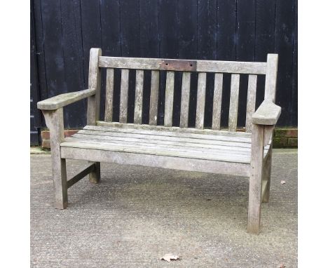 A wooden slatted garden bench, 132cm
