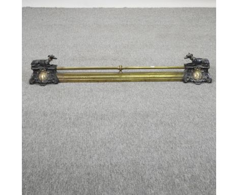 A 19th century French adjustable brass fender, with dog supports, 116cm