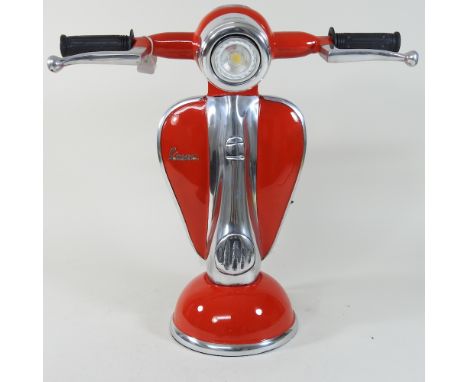 A modern lamp, in the form of a red scooter, 38cm high