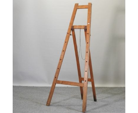 A wooden folding artist's easel, 176cm high