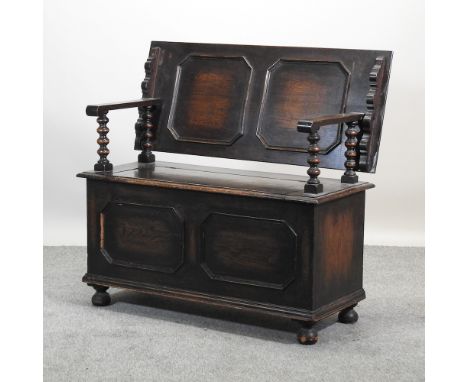 An early 20th century oak monk's bench, 107cm