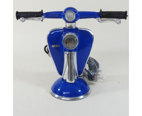 A modern lamp, in the form of a scooter, 23cm high
