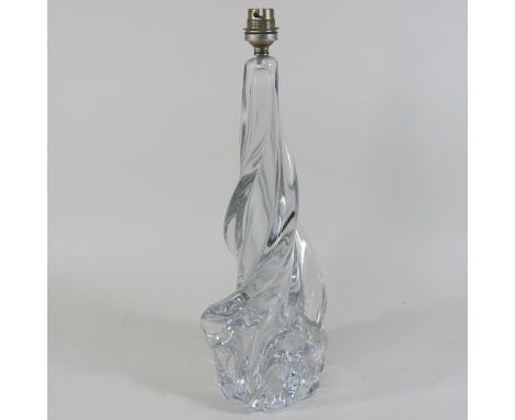 An early 20th century French heavy glass lamp base, of twisted abstract form, signed Cristal Ile De France to the base, 41cm 