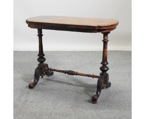 A Victorian walnut card table, 92cm
