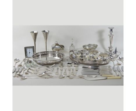 A collection of silver and plated items, to include two trays, a candlestick, scent bottles, and a collection of cutlery