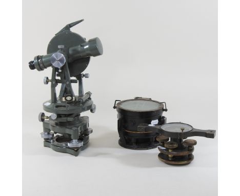 A mid 20th century surveyor's tool, together with a compass, and another