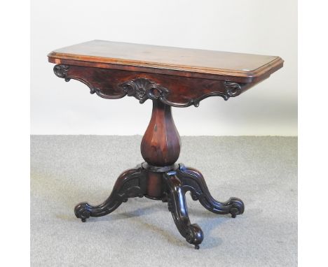 A Victorian rosewood card table, on a quadruped base, 92cm