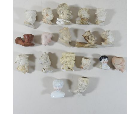 A collection of 19th century and earlier clay pipe heads