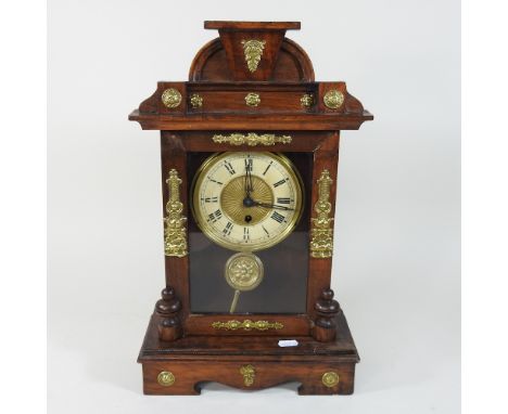 A early 20th century continental brass mounted mantel clock, 48cm high