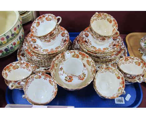 Samuel Radford Crown China Early XX Century Tea Service, of forty pieces with floral border in rust red, black and gilt..