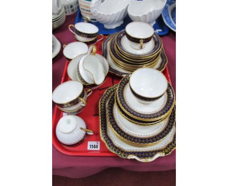 Aynsley Tea Service of Thirty-Six Pieces, circa 1920's, with dark blue and gilt floral decoration to border.