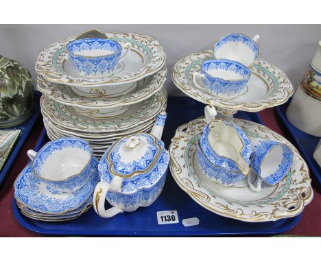 A XIX Century Dessert Service, probably Minton, plus two small and one large comport, eight plates having turquoise and lily 