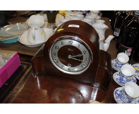 An Elko Art Deco three hole mantel clock 