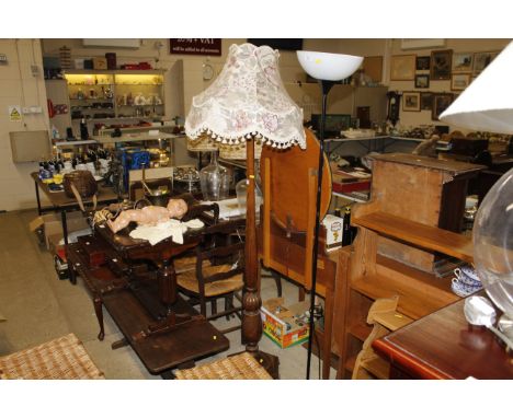 An oak standard lamp and shade