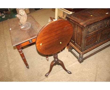 A 19th Century mahogany snap top table, raised on tripod base AF