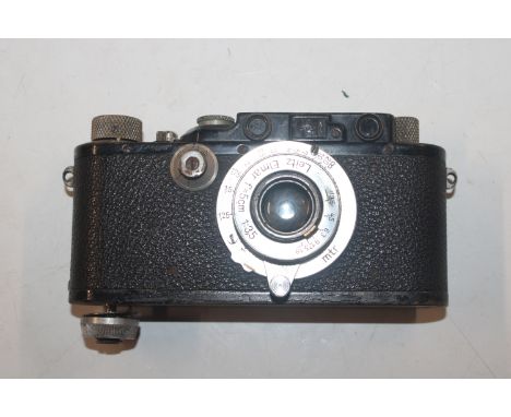 A Leica Ernst Leitz Wetzla D.R.P. camera with Leica leather case AF