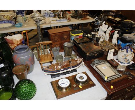 A Corinthian column candle stick; tankards; miniature rocking chair; model boat; clock and barometer