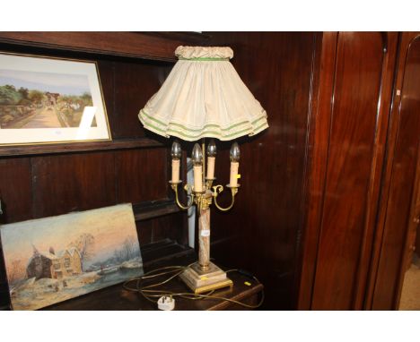 A four branch onyx table lamp and shade