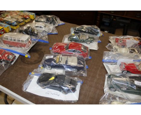 A quantity of Franklin Mint die-cast models to include Porsche 911, The Rolls Royce Chronic 4, 1961 Jaguar E Type etc. AF