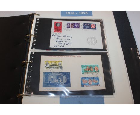 A box containing the Royal Family stamp album, various First Day covers and mixed world stamps 