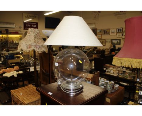 A glass table lamp and shade 