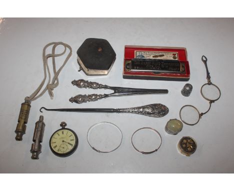 A box containing a silver plated pocket watch; a City Police whistle; silver handled glove stretchers and button hook; silver