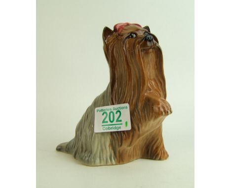 Royal Doulton Beswick model of a Yorkshire Terrier with paw raised: 