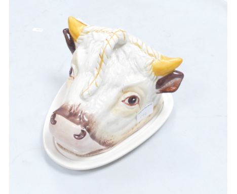 A 20th Century ceramic tongue dish: inform of bulls head. height 20cm 